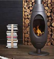 Печь-камин Invicta OVE стальная в интерьере Амазонка бай фото в Лиде