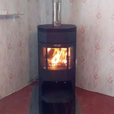 Недорогой камин с отделкой шамотом Сибирь 12 фото в интерьере в Лиде