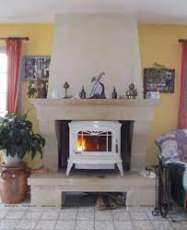 Печь-камин чугунный Invicta Bradford в интерьере Амазонка бай фото в Лиде