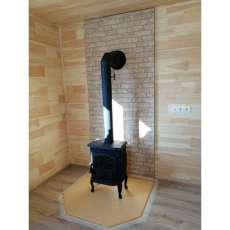 Чугунный камин со стеклом Сибирь 7 фото в интерьере в Лиде