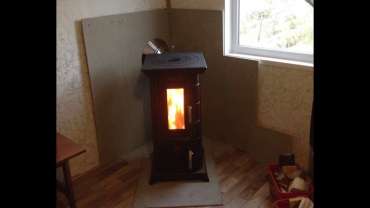 Отопительная печь Термофор Статика Тетра, чёрная бронза фото в интерьере в Лиде