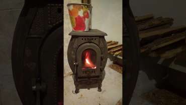 Печь отопительно-варочная чугунная "Сибирь" фото в интерьере в Лиде