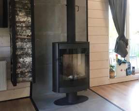 Печь-камин с теплообменником Мета-Бел АОТ 7.0-01 Свитязь фото в интерьере в Лиде