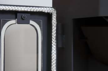 Стальной недорогой камин Бавария призматик пристенно-угловой фото в Лиде