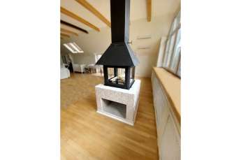 Стальной камин Эклипс островной 4D графит фото в интерьере в Лиде