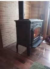 Печь-камин чугунный FireWay Gunter в интерьере чёрный Амазонка бай фото в Лиде