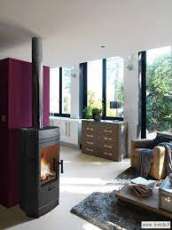 Печь-камин чугунный Invicta Gomont в интерьере Амазонка бай фото в Лиде