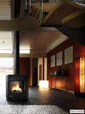 Печь-камин чугунный Invicta Carolo в интерьере Амазонка бай фото  в Лиде