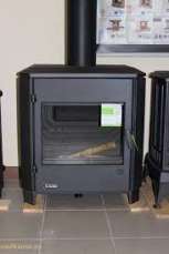 Печь-камин чугунный Invicta Carolo в интерьере Амазонка бай фото  в Лиде