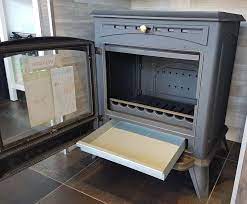 Печь-камин чугунный Invicta Altea в интерьере Амазонка бай фото в Лиде