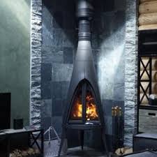 Печь-камин чугунный Invicta Pow-Wow в интерьере Амазонка бай фото в Лиде